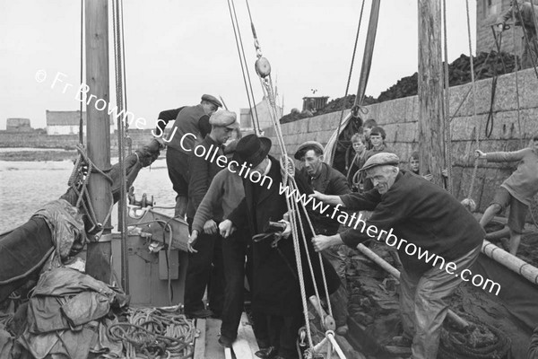 BOATS AND BOATMEN WITH LIFEBOAT TO INNISHMAAN CASHLA BAY  FR KILLEAN PP AND FR KEANE S.J.